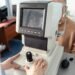Close-up of an autorefractor being used during pre-test in a UK independent optician practice