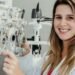 UK independent optician reviewing patient eye examination in practice — GOS claims